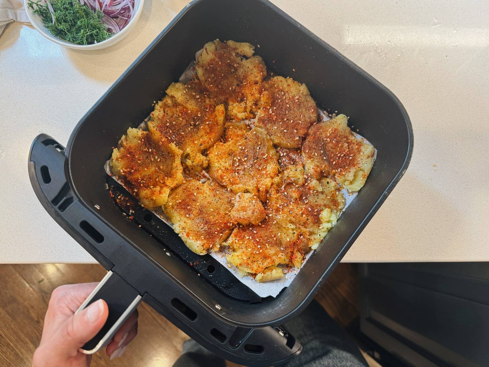 Smashed potatoes in an air fryer.