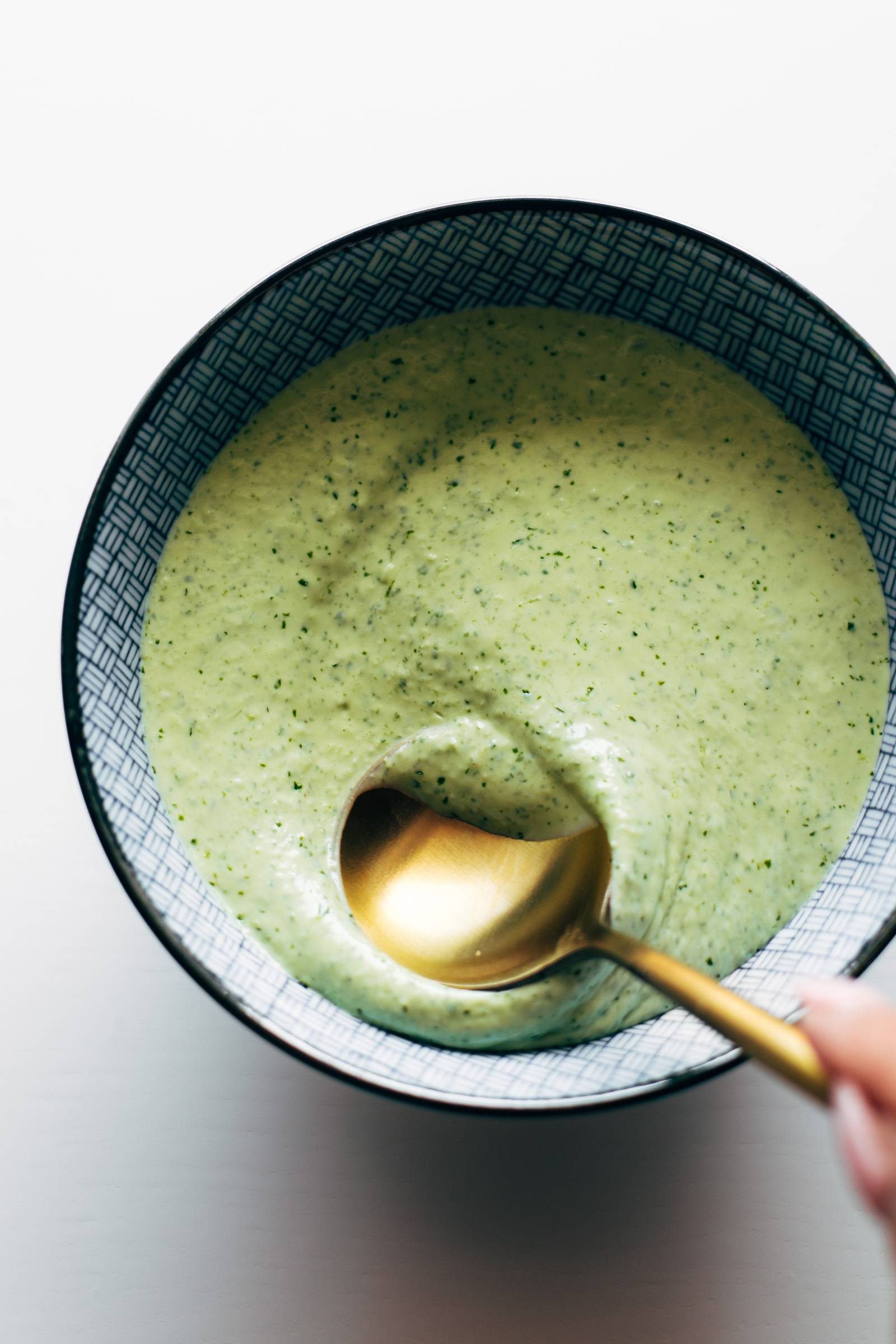 Aji verde in a bowl with a spoon