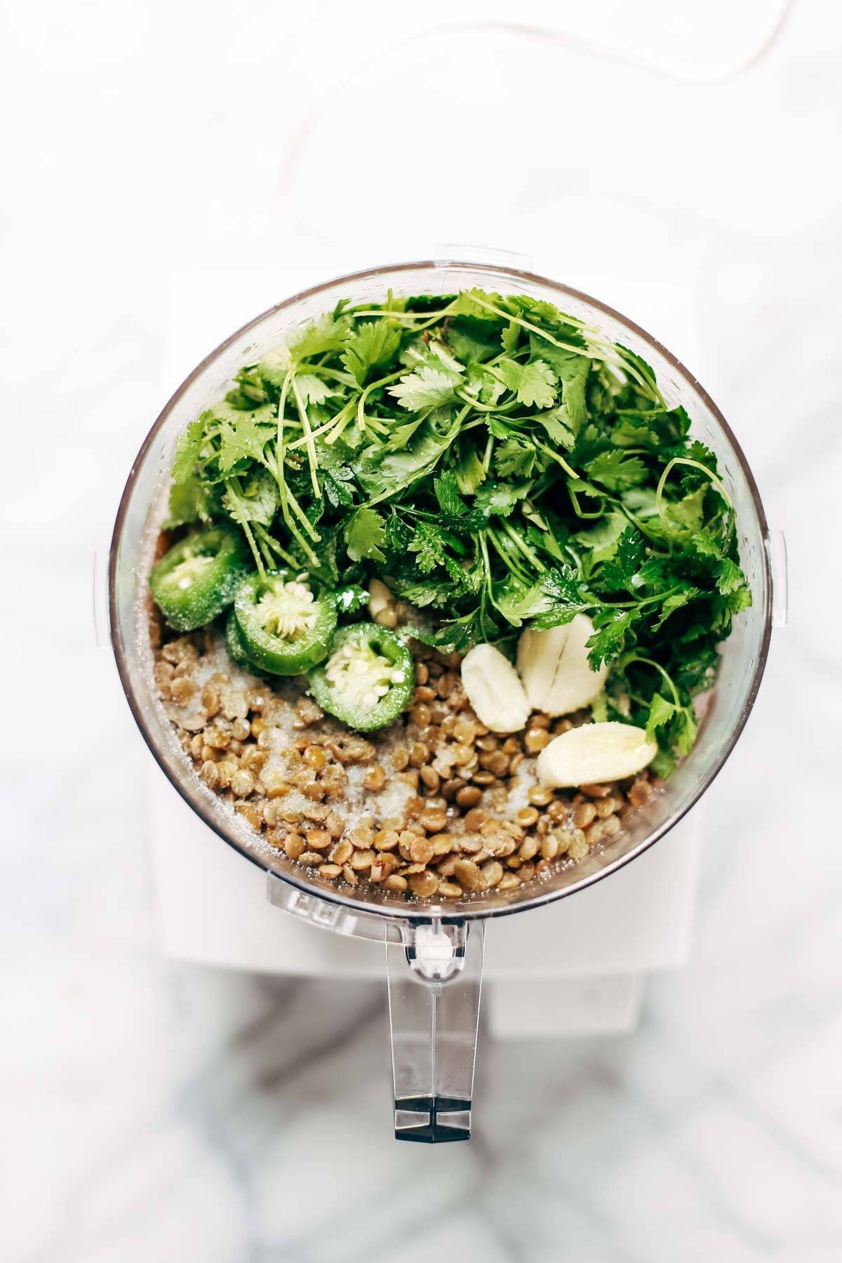 Naan-wich: 5 ingredient falafel, roasted veggies, and avocado sauce stuffed between pillowy garlic naan. Best sandwich recipe I've ever made. | pinchofyum.com