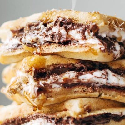 Smores Waffles in a stack with coconut sprinkle.