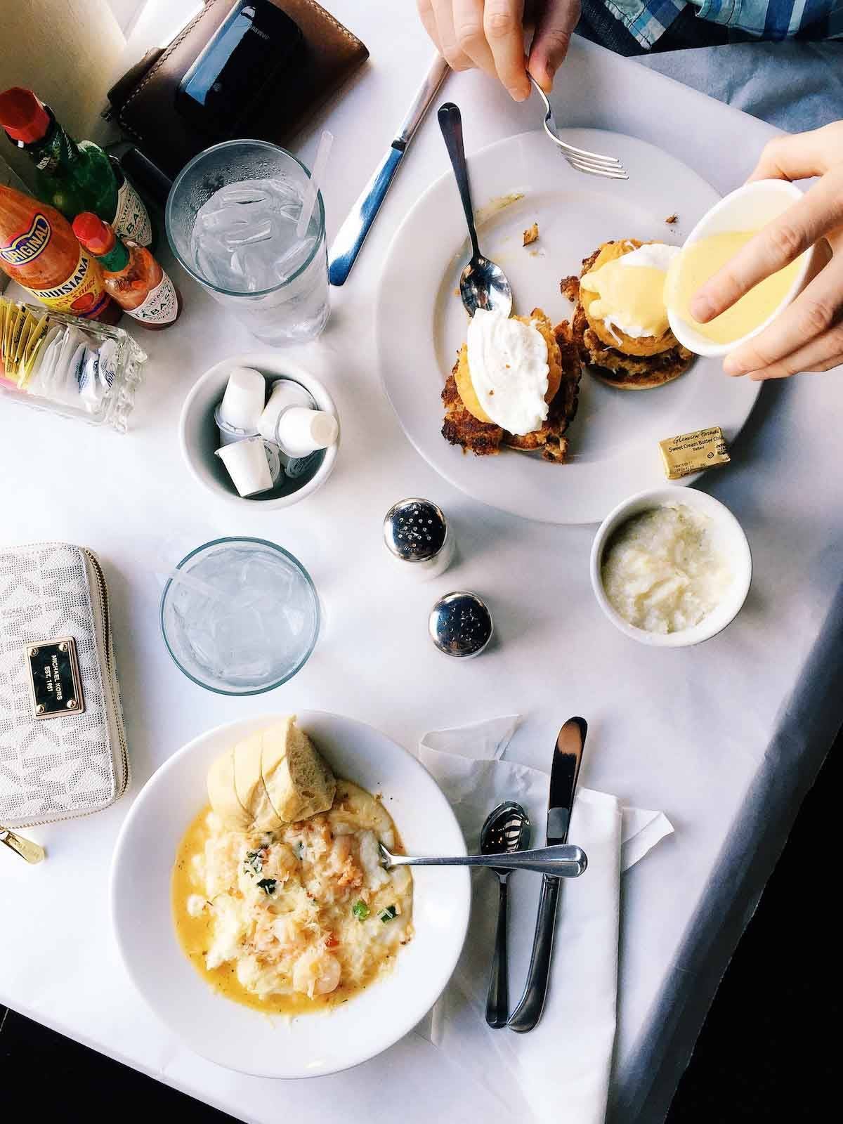 Table with plates of food.
